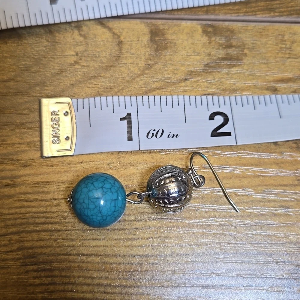 Blue and silver toned hanging earrings